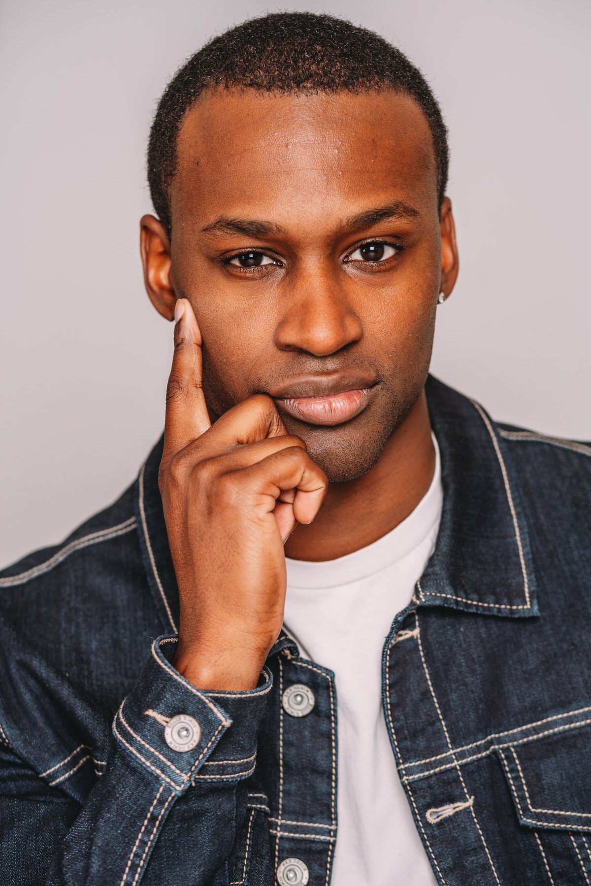 Editorial headshot with denim jacket