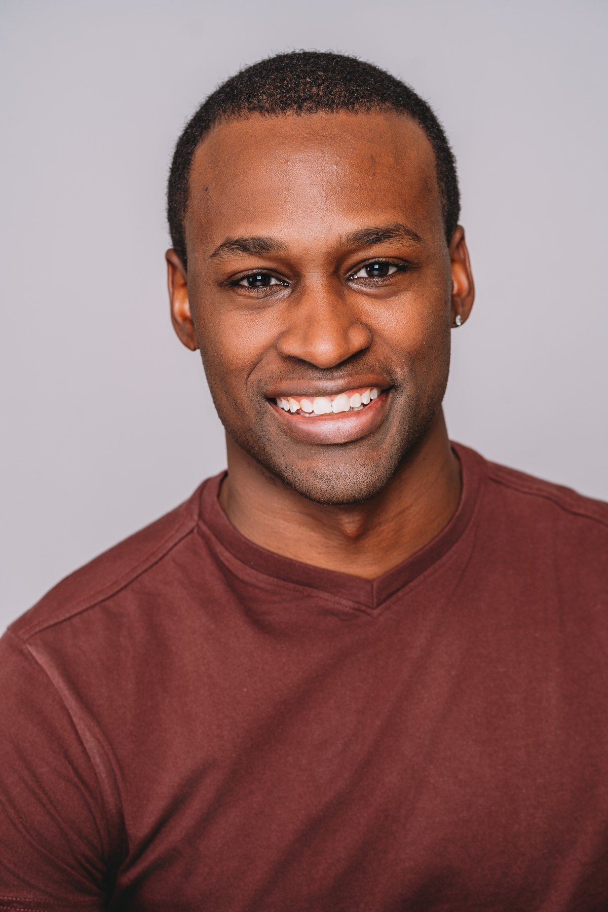 Smiling studio headshot
